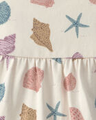 B&eacute;b&eacute; fille - Robe &agrave; &eacute;tages en coton biologique &agrave; motif de coquillages, image 3 sur 5 diapositives