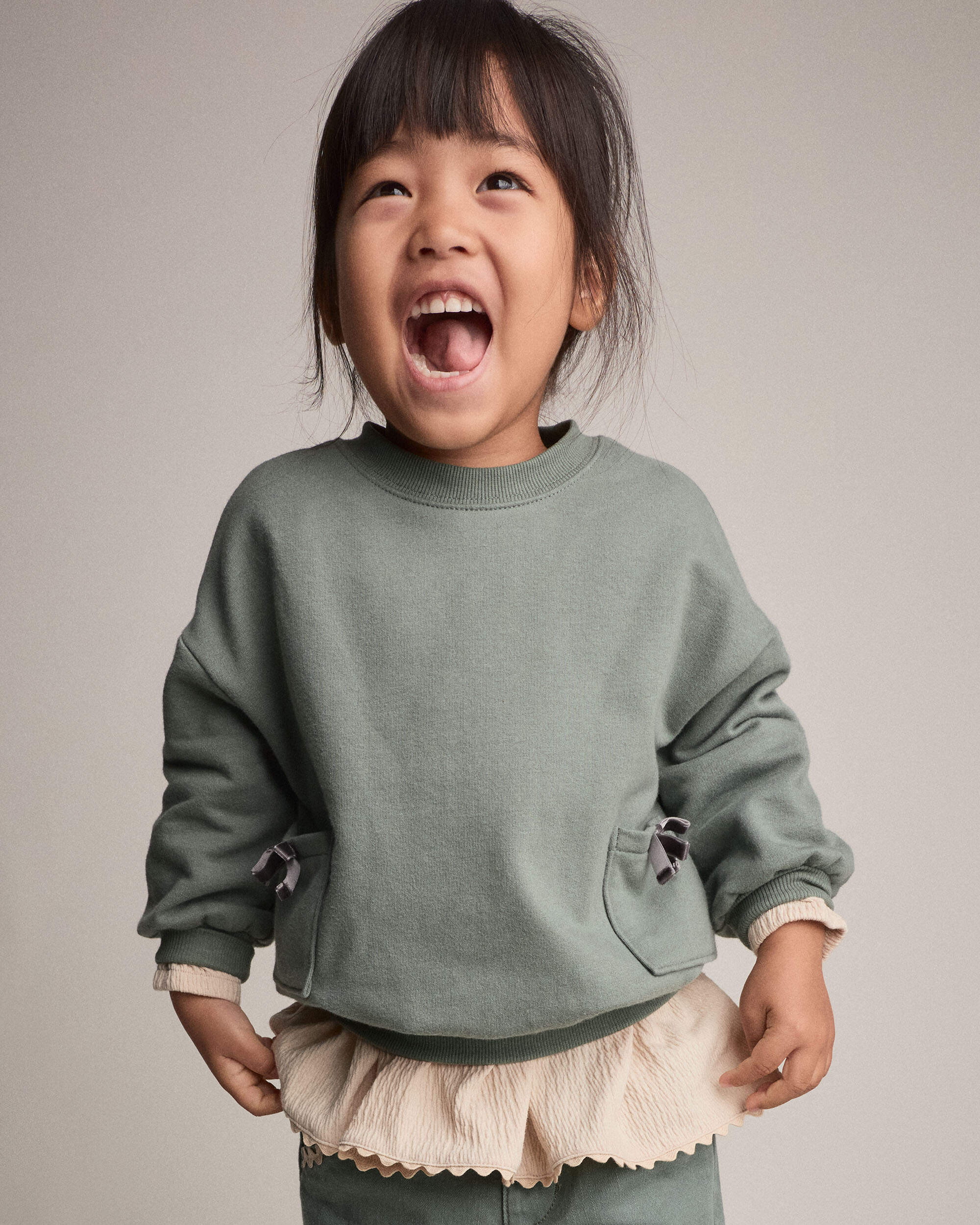 Toddler Girl Otter Sweatshirt™ with Bow Pockets - Olive